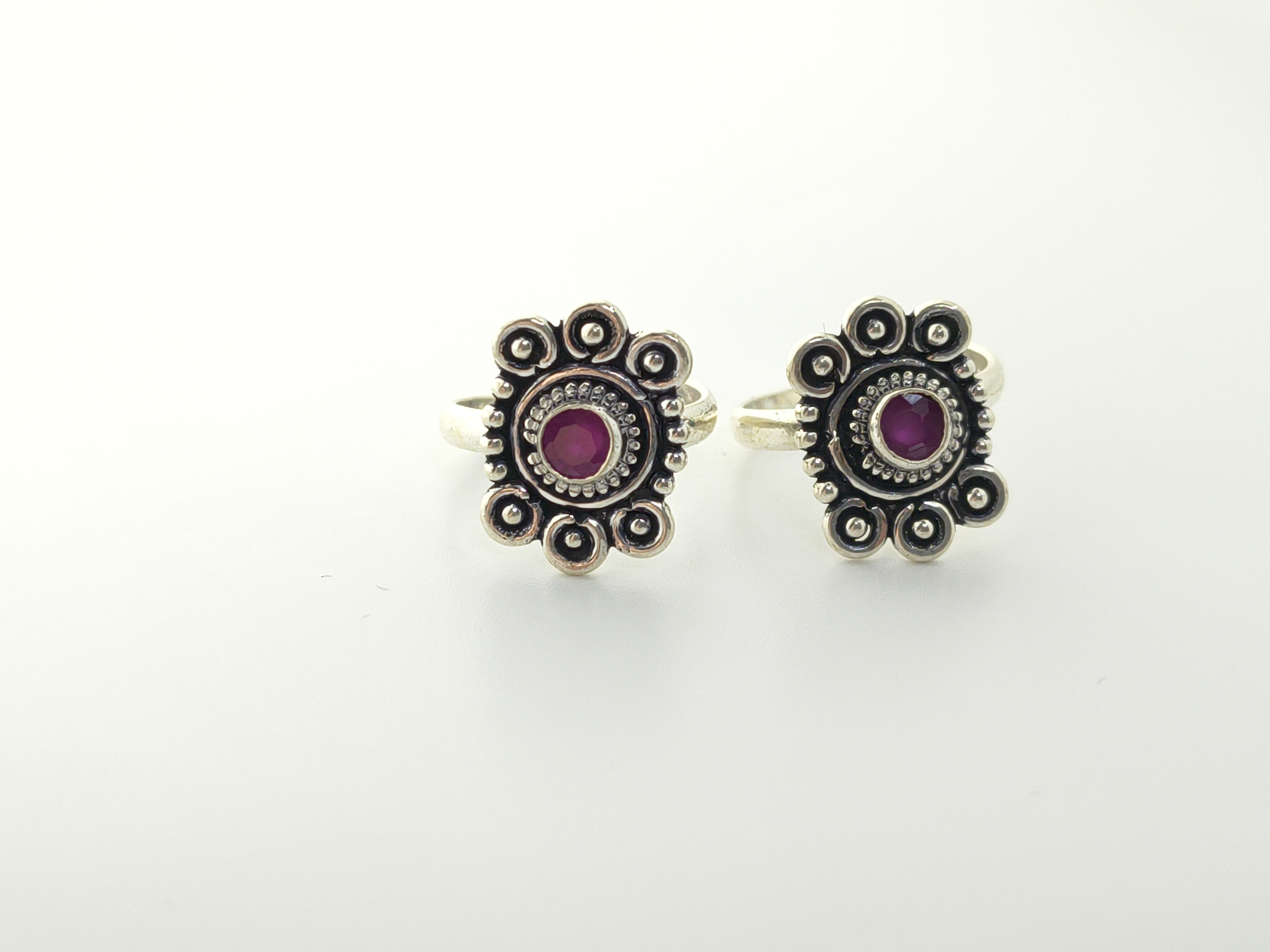Oxidized Sterling Silver Flower Toe Rings with Ruby Red Stone - Hover view